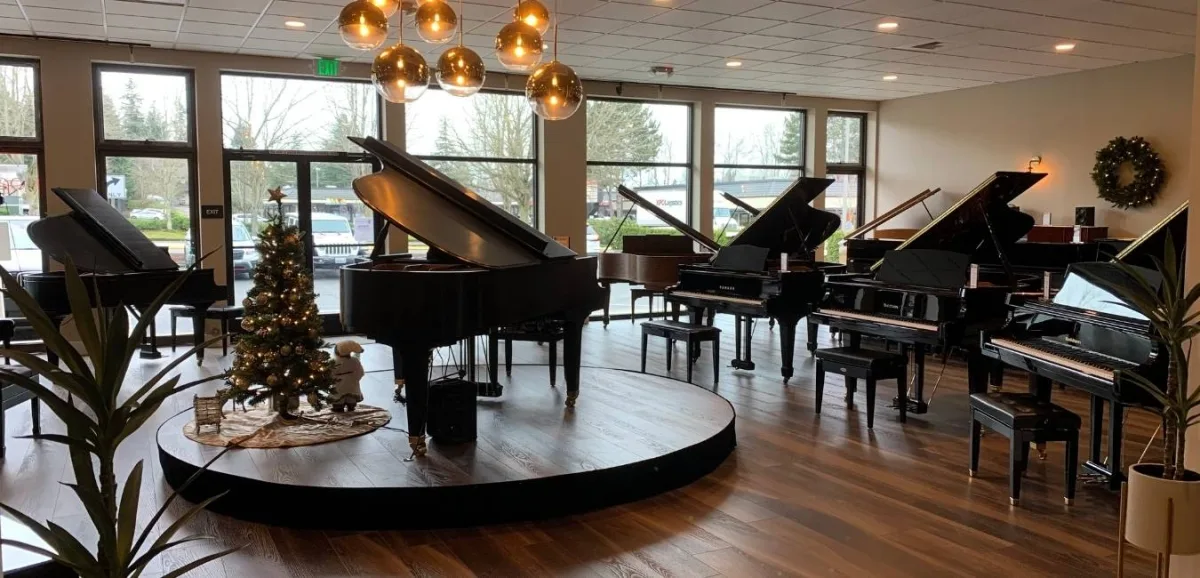Grand pianos on display in a piano showroom